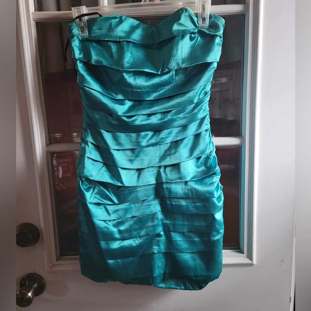 Teal strapless dress with sparkle crossed back